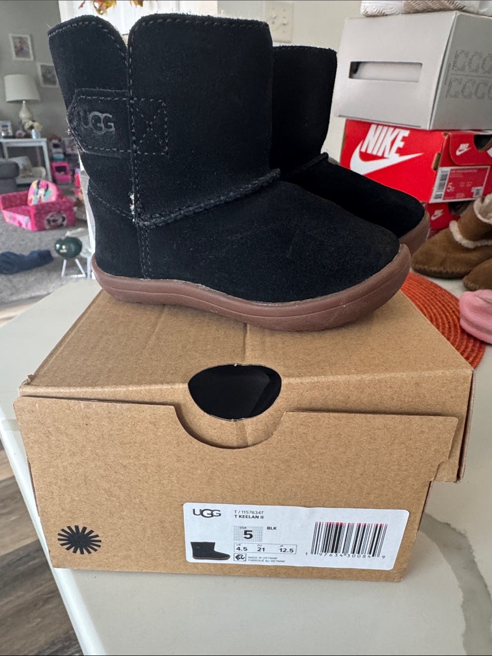 UGG Kids Black Suede Shearling Boot with Brown Sole